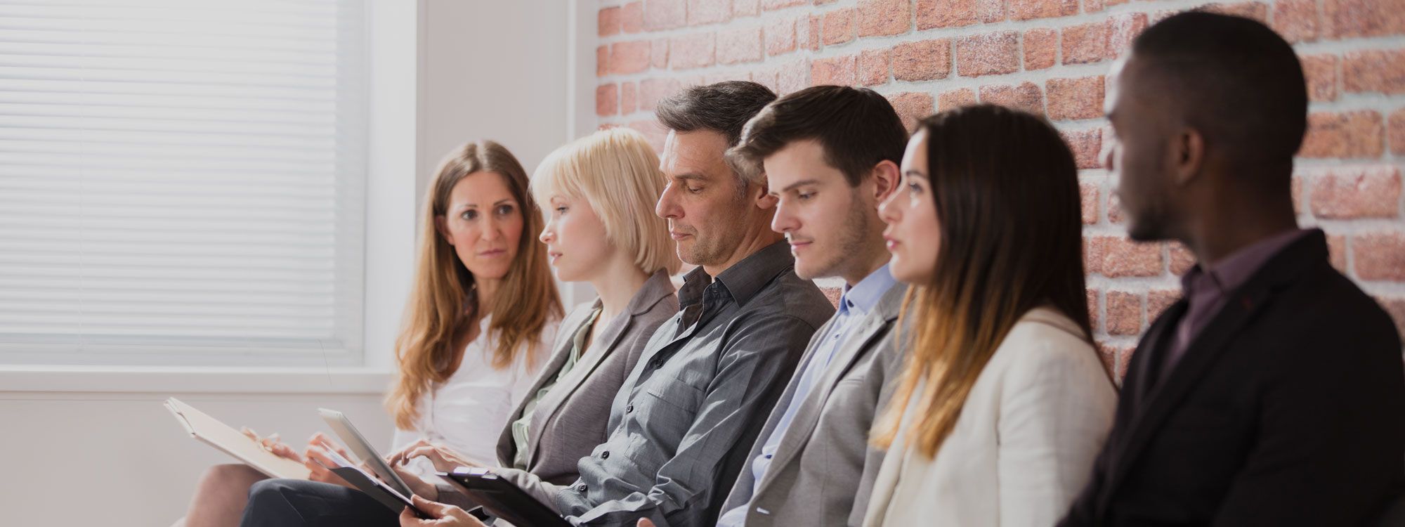 Interview candidates in waiting area